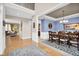 Elegant dining room featuring hardwood floors and decorative lighting fixture at 1313 Brentford Ln, Greenwood, IN 46143