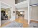 Bright foyer with hardwood floors offers seamless access to living spaces at 1313 Brentford Ln, Greenwood, IN 46143