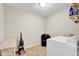 Functional laundry area featuring a modern washer and dryer for efficient home tasks at 1313 Brentford Ln, Greenwood, IN 46143