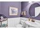 Stylish powder room with modern fixtures and decorative accents at 1313 Brentford Ln, Greenwood, IN 46143
