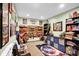 Organized room with playful décor, storage solutions, and fun activity areas at 1313 Brentford Ln, Greenwood, IN 46143