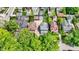 Aerial neighborhood view highlighting the home's landscaped yard and proximity to other well-kept properties at 140 W Hampton Dr, Indianapolis, IN 46208