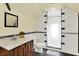 Stylish bathroom featuring tiled walls and floors, vanity, and shower at 140 W Hampton Dr, Indianapolis, IN 46208