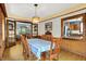 Open dining room features hardwood floors and sight lines to the kitchen and living room at 140 W Hampton Dr, Indianapolis, IN 46208