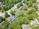 A lush aerial view showcases the mature trees and large properties at 1408 126Th St, Carmel, IN 46033