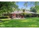 Expansive backyard with a patio, picnic table, and plenty of green space, perfect for entertaining at 1408 126Th St, Carmel, IN 46033