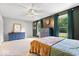 Large primary bedroom with dark trim, many windows, and neutral carpet at 1408 126Th St, Carmel, IN 46033