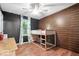 Modern bedroom with wood accent wall, bunk bed, and natural light from the window at 1408 126Th St, Carmel, IN 46033