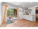 Bright dining area with sliding glass doors leading to a patio, perfect for indoor-outdoor living at 1408 126Th St, Carmel, IN 46033