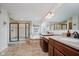 Ensuite bathroom featuring a walk-in shower, soaking tub, and dual vanities at 14662 Woodstone Cir, Fishers, IN 46037