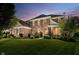 Elegant brick home with manicured lawn and lush landscaping, perfect for sophisticated living at 14662 Woodstone Cir, Fishers, IN 46037