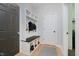 Mudroom with built-in bench, storage cubbies, and neutral color scheme at 14662 Woodstone Cir, Fishers, IN 46037
