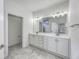 Bathroom with double vanity, marble countertop, and views into the shower and toilet room at 14844 Higgins Dr, Westfield, IN 46074