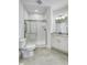 Bathroom features a tiled shower, granite countertop vanity, and tile flooring at 14844 Higgins Dr, Westfield, IN 46074