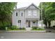 Charming two-story home featuring a classic design, inviting porch, and well-maintained landscaping at 1512 Bellefontaine St, Indianapolis, IN 46202