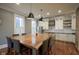 Bright and airy kitchen with a large center island, modern lighting, and ample counter space at 1512 Bellefontaine St, Indianapolis, IN 46202