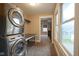 Laundry room with washer and dryer units at 1512 Bellefontaine St, Indianapolis, IN 46202