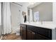 Modern bathroom with double sink vanity, a large mirror, and a shower over bathtub at 1655 Avondale Dr, Westfield, IN 46074