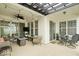 Inviting covered patio with string lights, offering ample seating, and a cozy outdoor dining area at 1655 Avondale Dr, Westfield, IN 46074