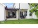 Outdoor patio with pergola, featuring comfortable seating and a dining area with a table and chairs at 1655 Avondale Dr, Westfield, IN 46074