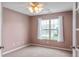 Bedroom featuring neutral carpet, natural light, and access to the home's backyard at 16956 Fulton Pl, Westfield, IN 46074