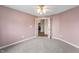 Bedroom featuring neutral carpet, natural light, and access to the home's interior at 16956 Fulton Pl, Westfield, IN 46074