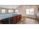 Modern kitchen with a breakfast bar and stainless steel appliances at 16956 Fulton Pl, Westfield, IN 46074
