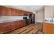 Kitchen featuring granite countertops, stainless steel appliances, and hardwood floors at 16956 Fulton Pl, Westfield, IN 46074
