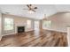 Open living area with fireplace and sliding glass doors that lead to an outdoor living space at 16956 Fulton Pl, Westfield, IN 46074
