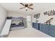 Fun bedroom with bunk beds, slide, and modern themed decor at 1715 Foudray S Cir, Avon, IN 46123