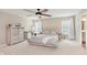 Comfortable main bedroom with natural light and a ceiling fan at 1715 Foudray S Cir, Avon, IN 46123