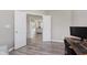 Bright office space featuring a modern desk, comfortable seating, and wood-look flooring, perfect for working from home at 1715 Foudray S Cir, Avon, IN 46123