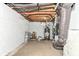 Unfinished basement space with concrete floor, visible utilities, and potential for customization at 1723 Fletcher Ave, Indianapolis, IN 46203
