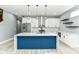 Spacious modern kitchen with a large center island, stainless steel appliances, and white cabinets at 1723 Fletcher Ave, Indianapolis, IN 46203