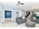 Spacious open-concept space with modern decor, a mudroom, and a view of the staircase at 1723 Fletcher Ave, Indianapolis, IN 46203