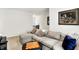 Inviting living room with plush sectional sofa, decorative pillows, and a chess table at 17319 Henslow Dr, Westfield, IN 46074