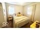Inviting bedroom with bright windows and neutral decor, perfect for peaceful sleep at 1820 Martin St, Indianapolis, IN 46237