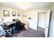 Bedroom with desk, closet, and neutral walls, perfect for a personal workspace at 1820 Martin St, Indianapolis, IN 46237