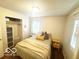Calm bedroom with a large closet, and soft lighting, making it ideal for relaxation at 1820 Martin St, Indianapolis, IN 46237
