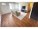 Inviting living room featuring wood floors, neutral walls and lots of natural light at 1820 Martin St, Indianapolis, IN 46237