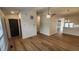 Bright, open-concept living area showcasing new flooring and fresh paint throughout at 1836 Queensbridge Cir, Indianapolis, IN 46219