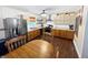 Well-equipped kitchen with wood cabinets, stainless steel appliances, and a dining table at 2015 Deer Lake Dr, Martinsville, IN 46151