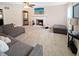 Spacious living room with a brick fireplace, TV, and comfortable gray sectional sofa at 2015 Deer Lake Dr, Martinsville, IN 46151