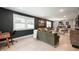 Open-concept living room featuring modern furnishings, plenty of natural light, and hardwood floors at 22 N Bolton Ave, Indianapolis, IN 46219