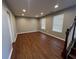 Finished basement area with wood flooring, recessed lighting, and stairs to the main level at 258 Coatsville Dr, Westfield, IN 46074