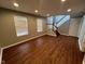 Finished basement area with wood flooring and stairs to the main level at 258 Coatsville Dr, Westfield, IN 46074