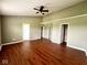 Spacious bedroom features vaulted ceilings, a ceiling fan, and stylish wood flooring at 258 Coatsville Dr, Westfield, IN 46074