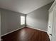 Sun-filled bedroom featuring a beautiful hardwood floor and a window at 258 Coatsville Dr, Westfield, IN 46074