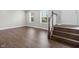 Entryway with hardwood floors, staircase, and natural light from large windows at 258 Coatsville Dr, Westfield, IN 46074