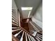 View of the home's foyer featuring hardwood floors, a staircase, and natural light at 258 Coatsville Dr, Westfield, IN 46074
